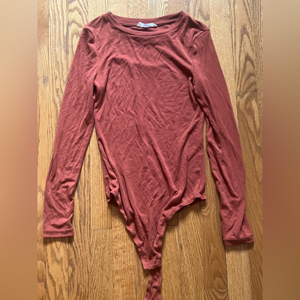 Long sleeve ribbed rusty orange bodysuit